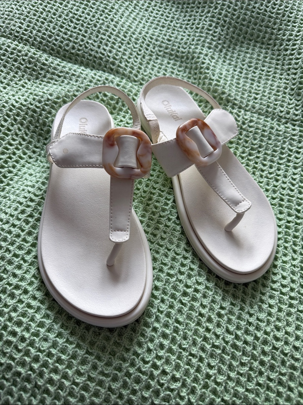 OluKai White T-Strap Sandals with Tortoiseshell Buckle